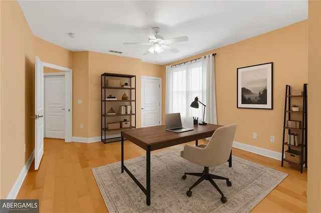 a view of a workspace with furniture