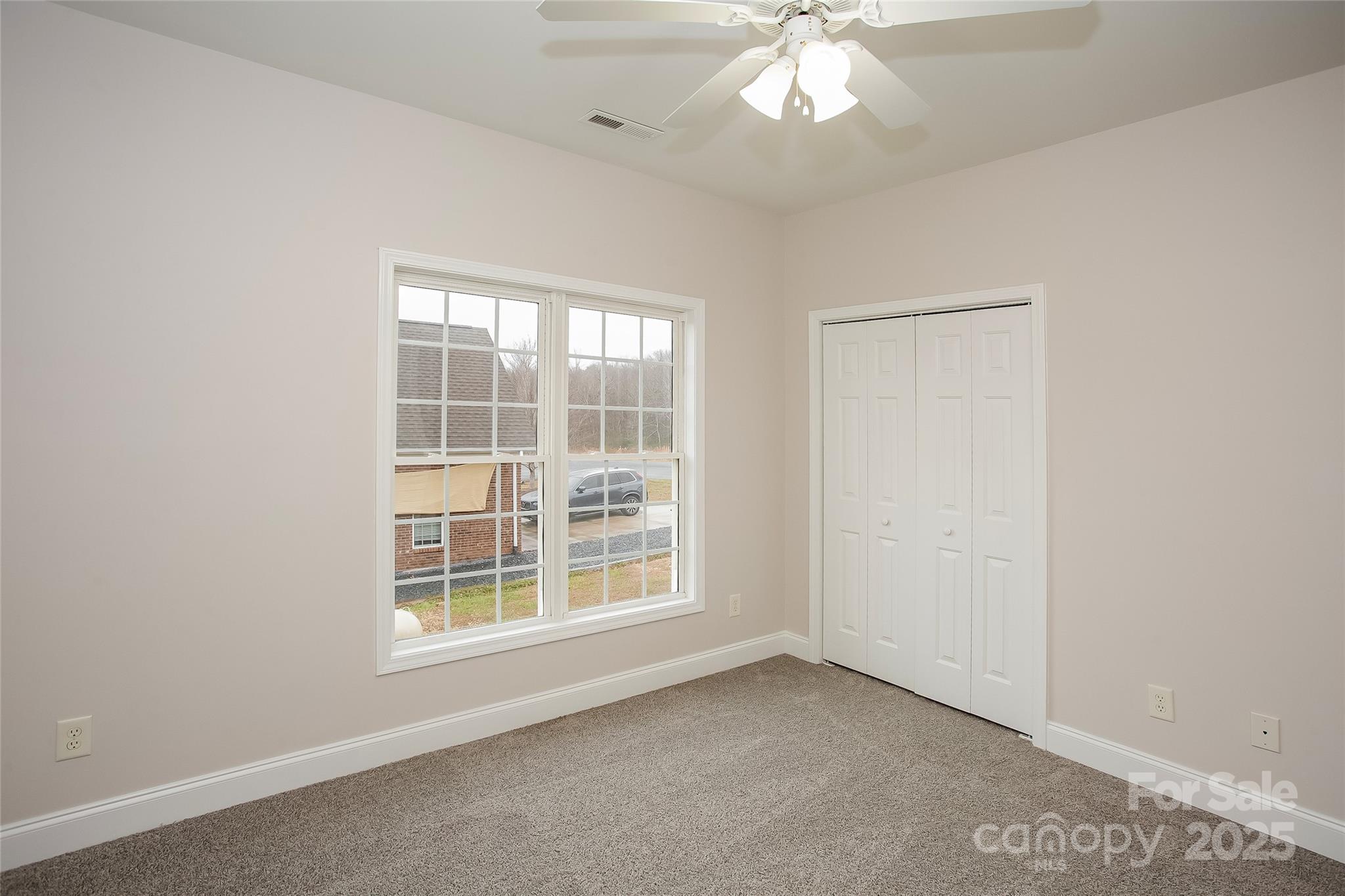 841 Old Farm Road Oakboro, NC 28129 - Photo 15 of 20 an empty room with a window