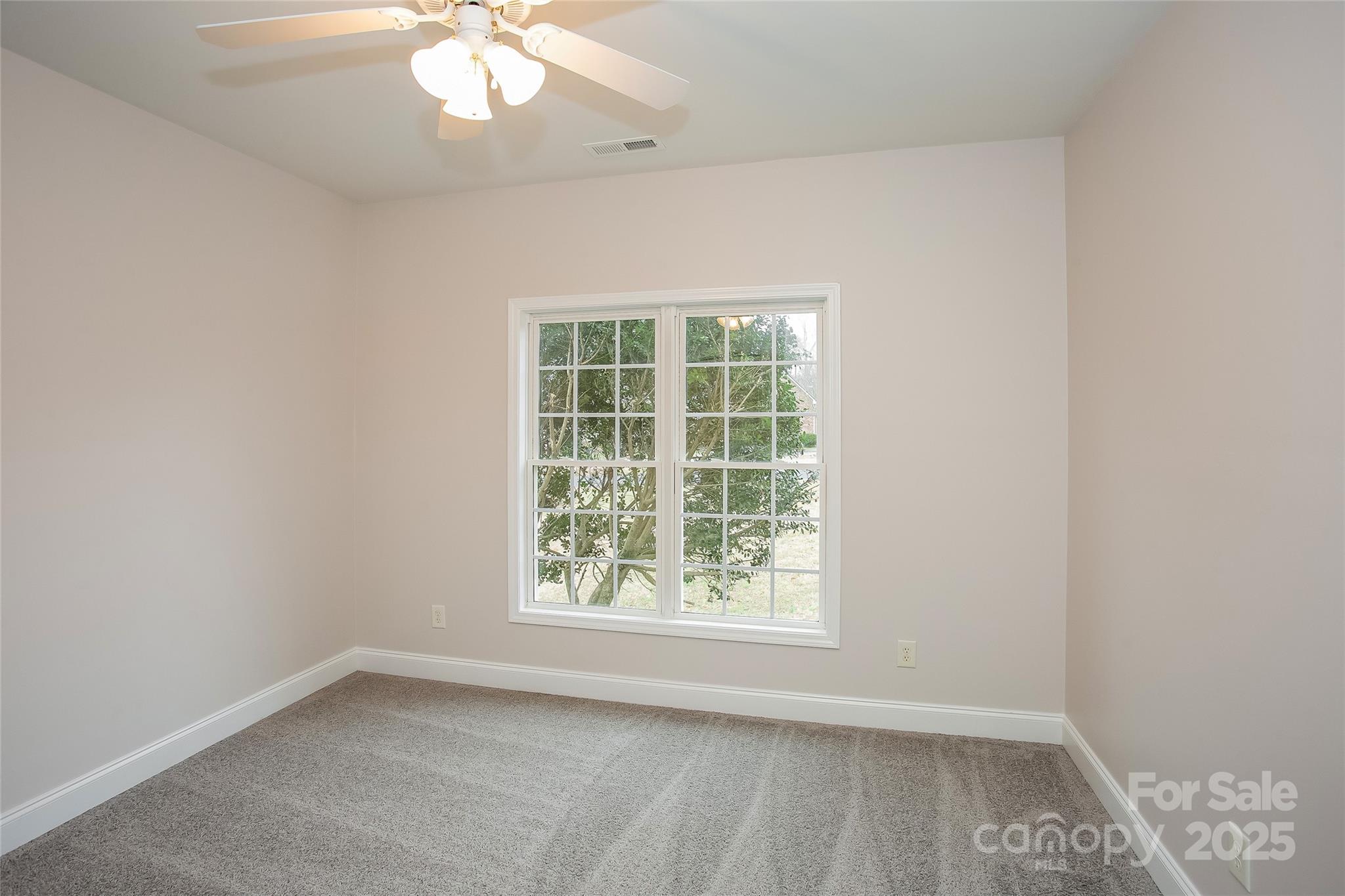 841 Old Farm Road Oakboro, NC 28129 - Photo 16 of 20 an empty room with a window