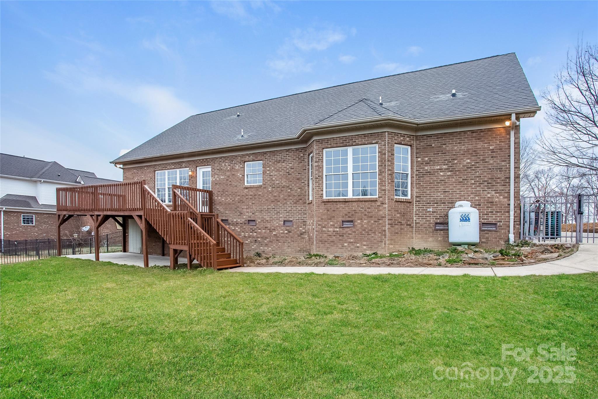 841 Old Farm Road Oakboro, NC 28129 - Photo 19 of 20 a front view of a house with garden