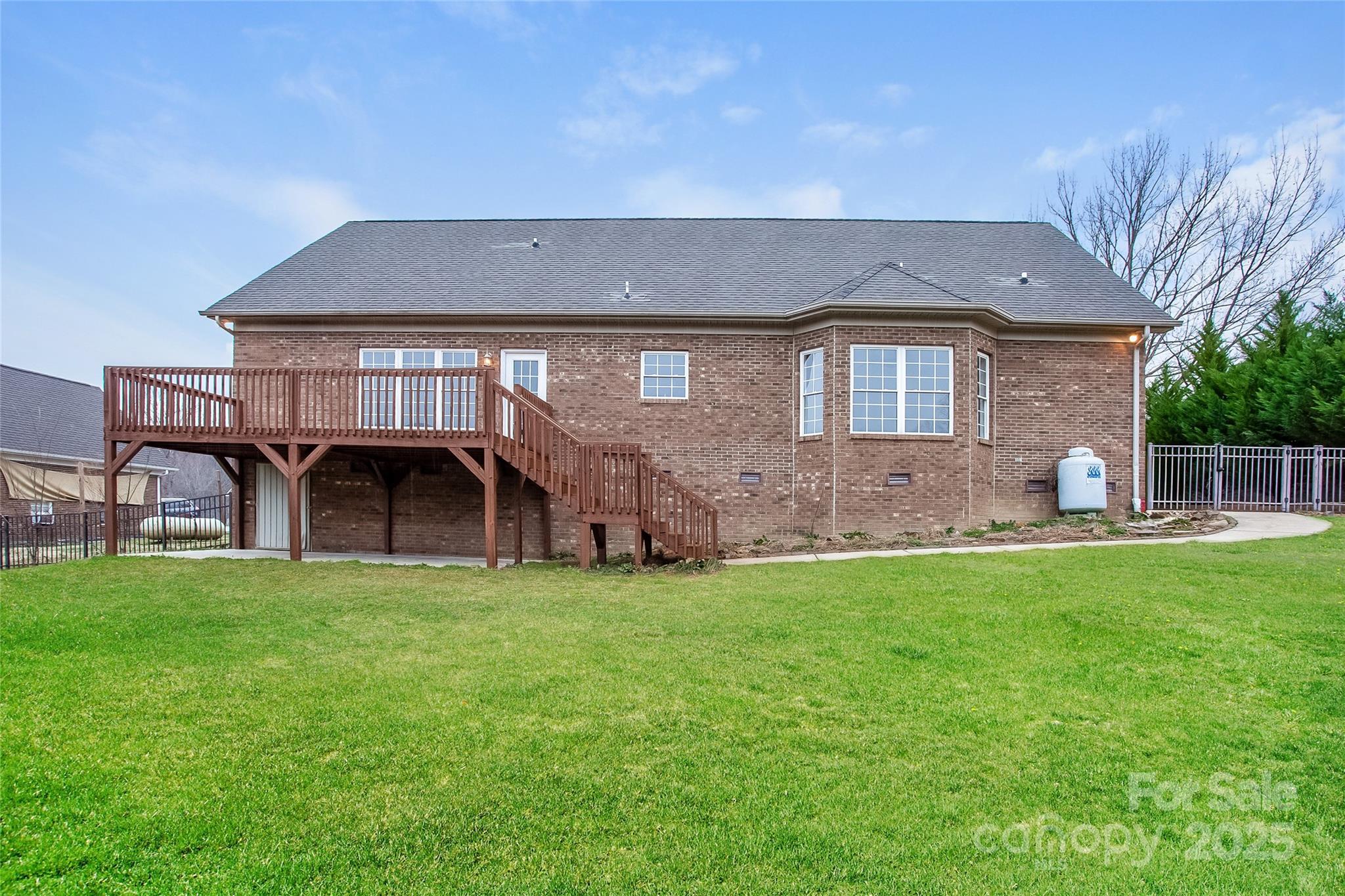 841 Old Farm Road Oakboro, NC 28129 - Photo 20 of 20 a front view of a house with a garden