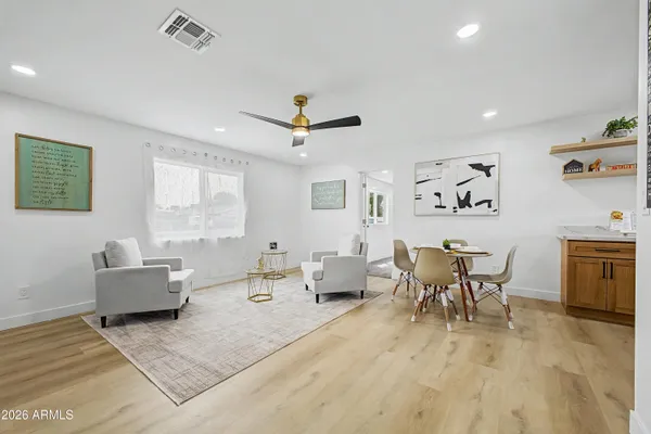a living room with furniture and a window