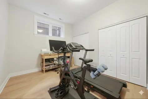 a view of a room with gym equipment