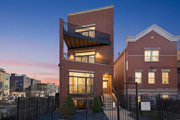 an aerial view of a city with lots of residential buildings