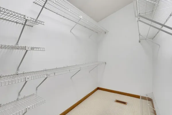 a view of a room with racks on the wall