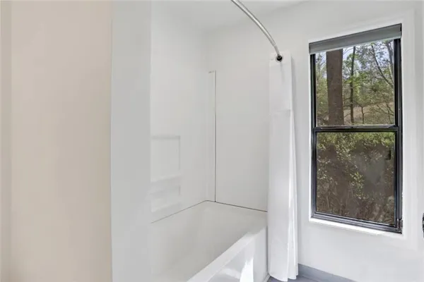 a bathroom with a bathtub