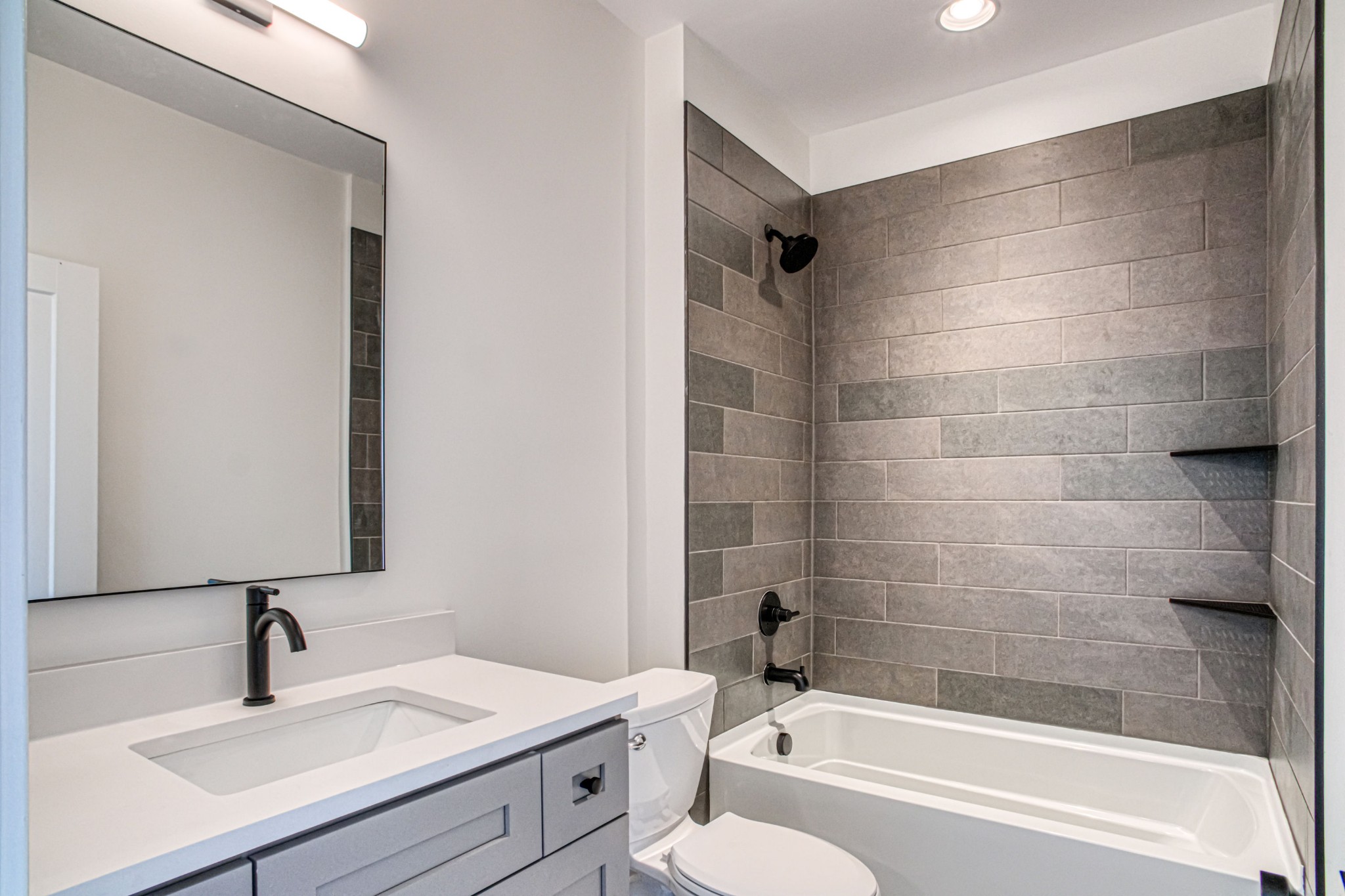 5871 Lakeview Road Springfield, TN 37172 - Photo 54 of 70 a bathroom with a sink toilet and shower