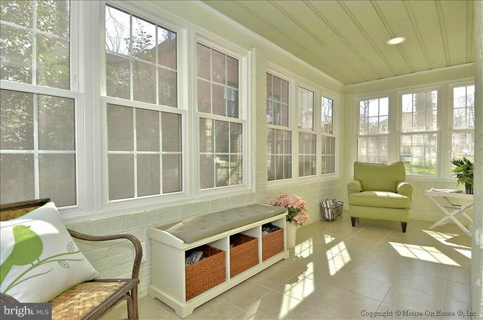 5512 Northfield Road Bethesda, MD 20817 - Photo 13 of 29 a living room with furniture and a large window