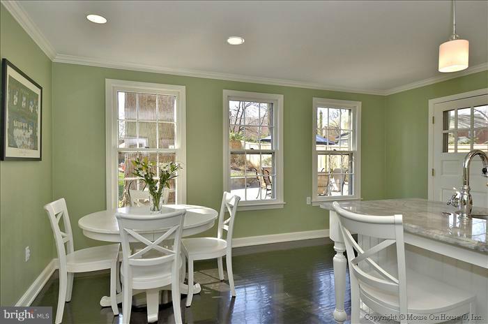 5512 Northfield Road Bethesda, MD 20817 - Photo 14 of 29 a dining room with furniture and wooden floor