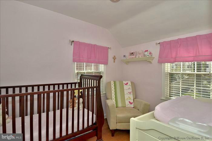 5512 Northfield Road Bethesda, MD 20817 - Photo 17 of 29 a living room with furniture and a window