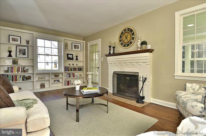 5512 Northfield Road Bethesda, MD 20817 - Photo 24 of 29 a living room with furniture and a fireplace