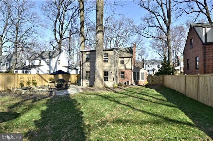 5512 Northfield Road Bethesda, MD 20817 - Photo 6 of 29 a view of a building with a yard