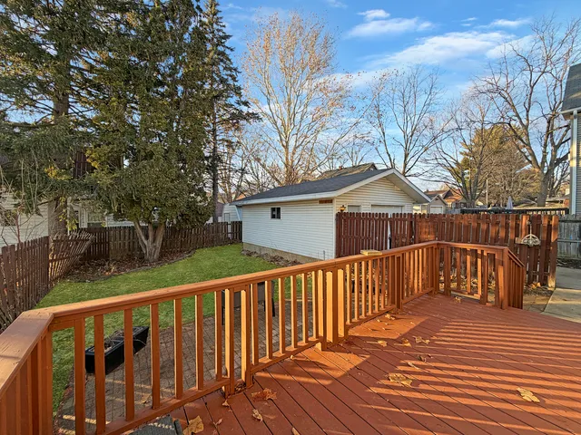 a view of deck with wooden floor and fence
