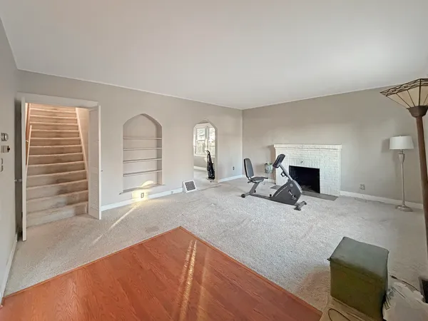 a view of a livingroom with a staircase