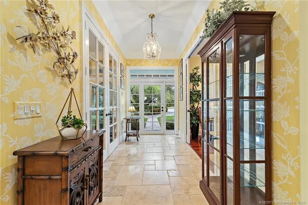 a kitchen with stainless steel appliances granite countertop a sink and a stove