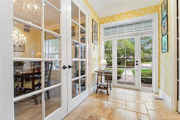 a view of a kitchen and dining area