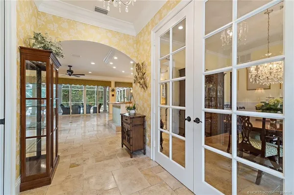 a view of entryway livingroom and hall