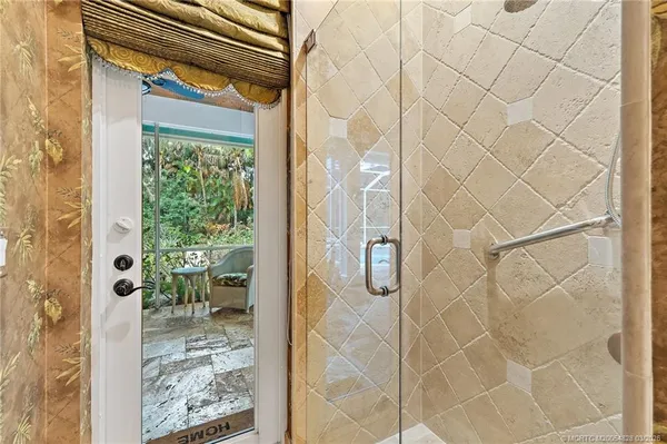 a bed room with a bed and a window