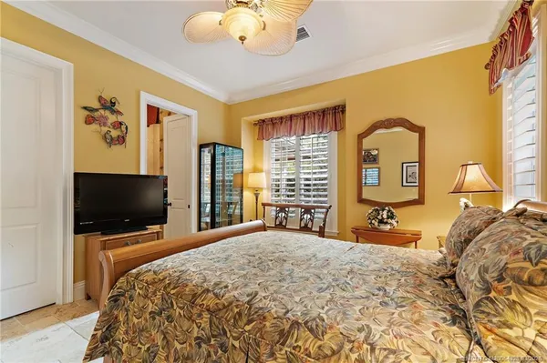 a dining table with chairs and window