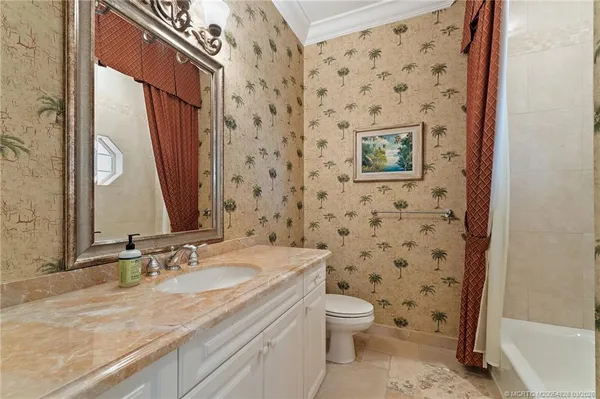 a view of a swimming pool with a yard