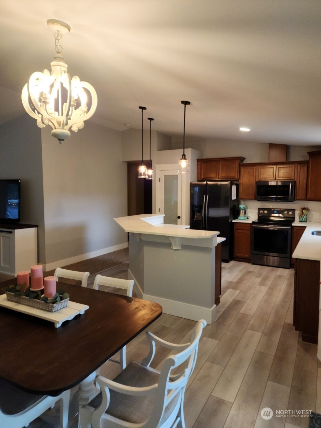 19312 Patterson Road East Orting, WA 98360 - Photo 12 of 39 a kitchen with a table and chairs in it