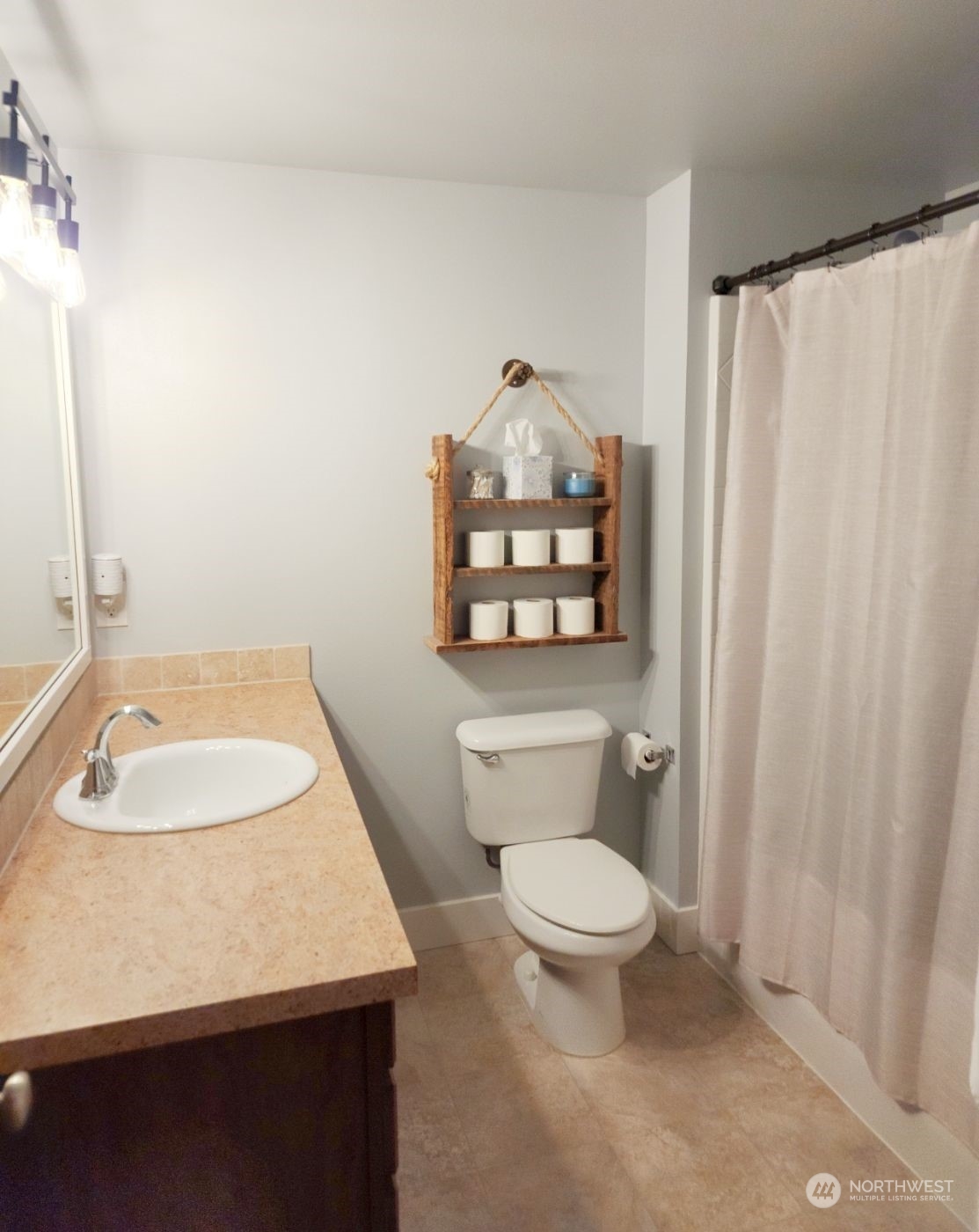 19312 Patterson Road East Orting, WA 98360 - Photo 17 of 39 a bathroom with a sink toilet and a mirror