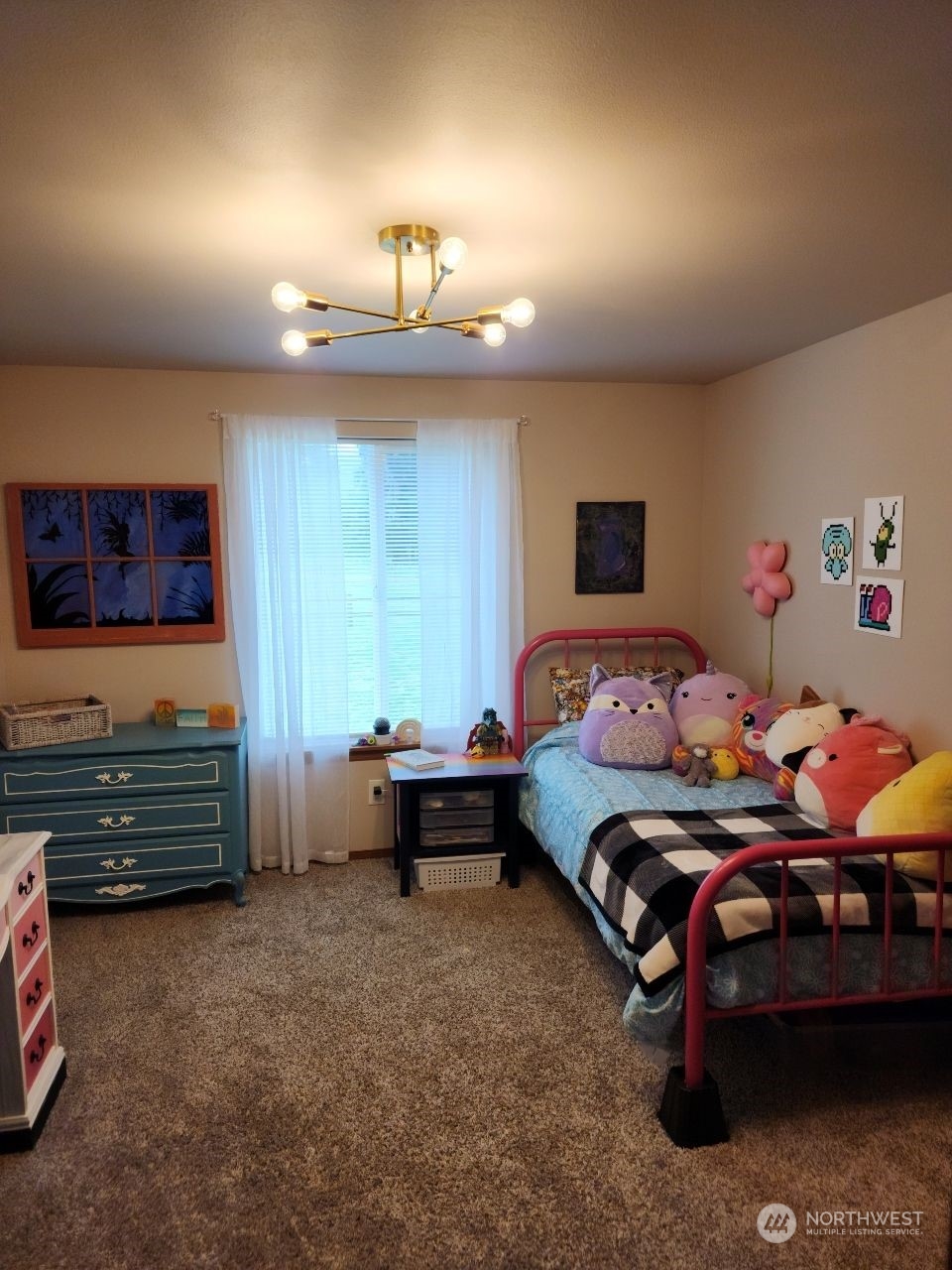 19312 Patterson Road East Orting, WA 98360 - Photo 18 of 39 a bedroom with furniture and a window