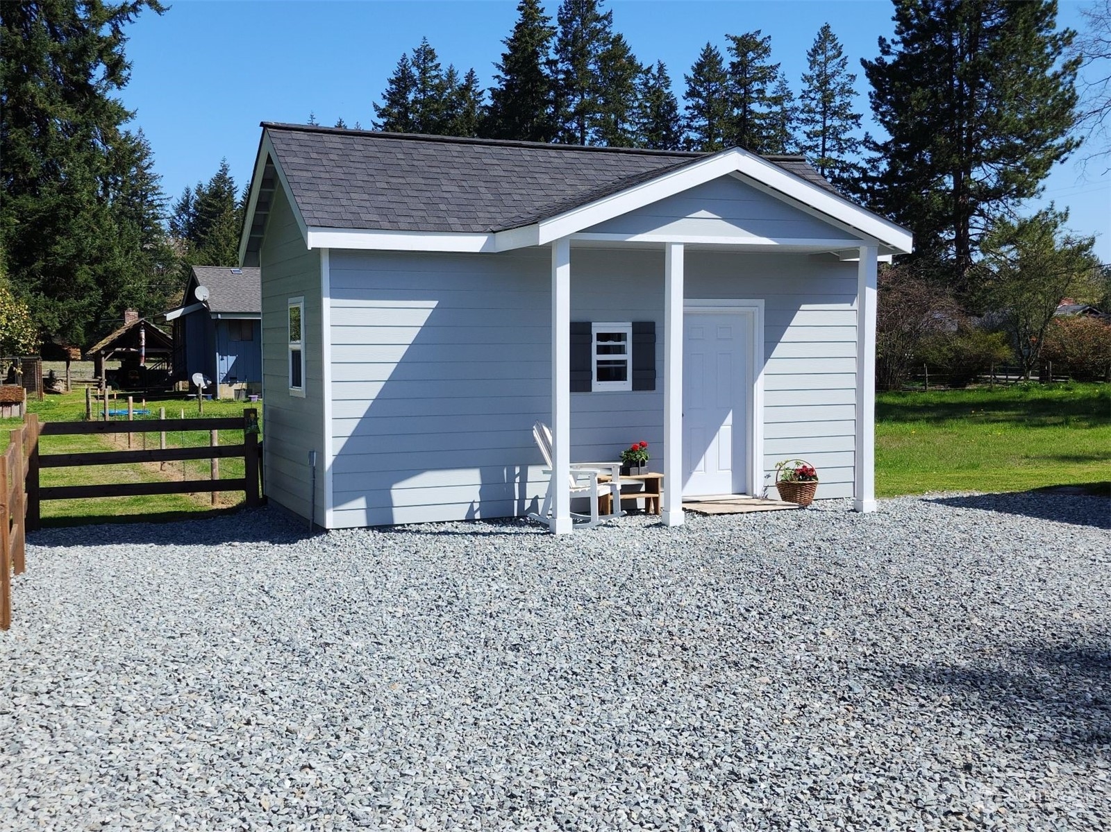 19312 Patterson Road East Orting, WA 98360 - Photo 24 of 39 a front view of a house with a garden