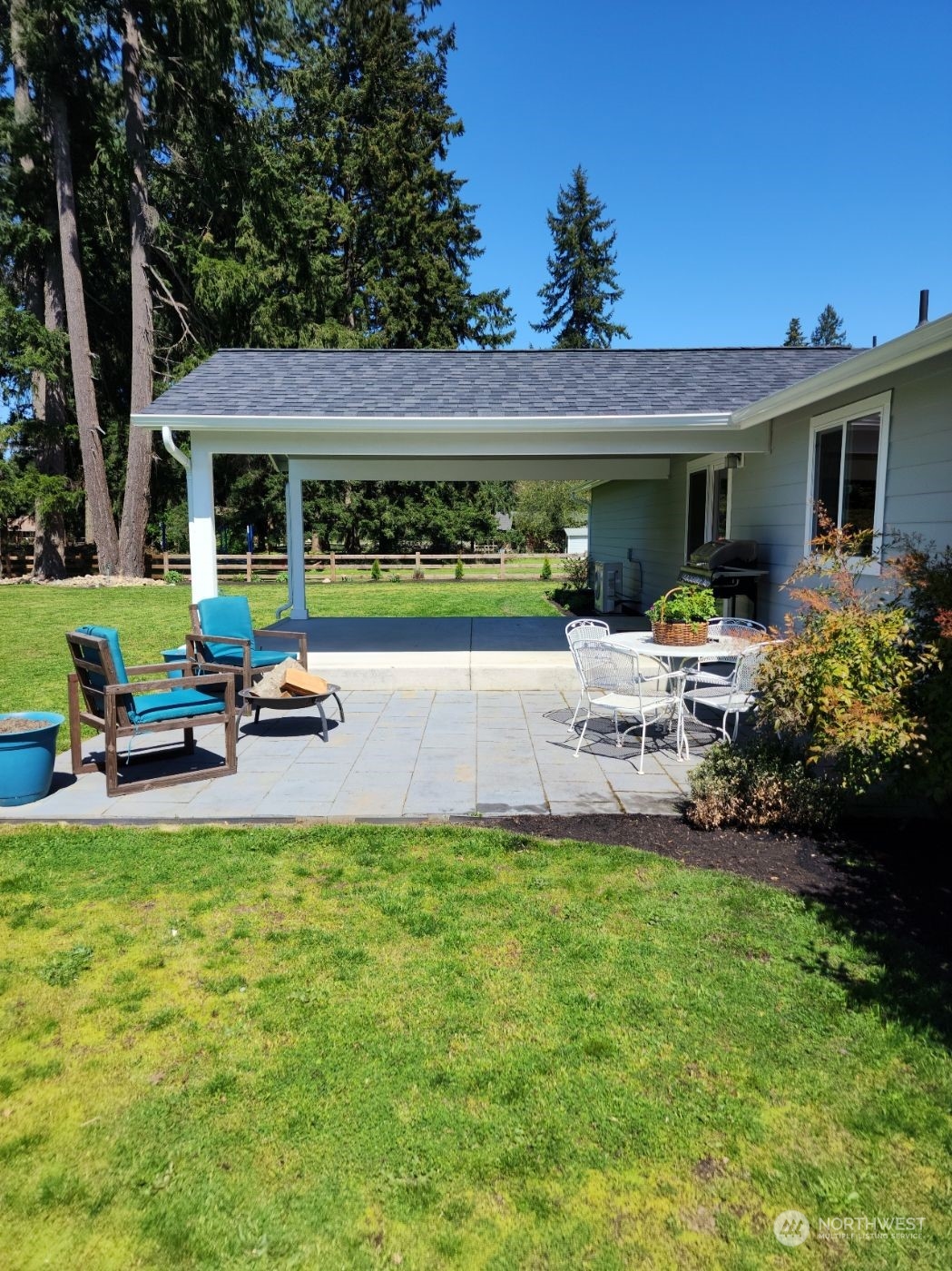 19312 Patterson Road East Orting, WA 98360 - Photo 30 of 39 a view of a house with backyard porch and sitting area