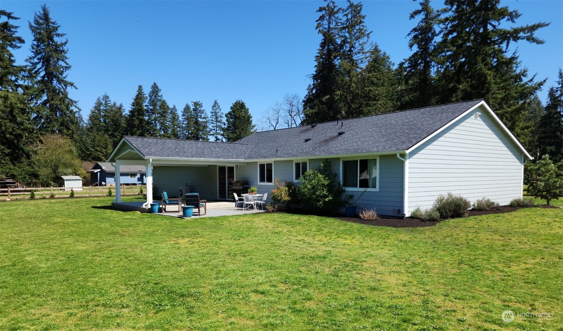 19312 Patterson Road East Orting, WA 98360 - Photo 6 of 39 a view of a house with a yard and sitting area