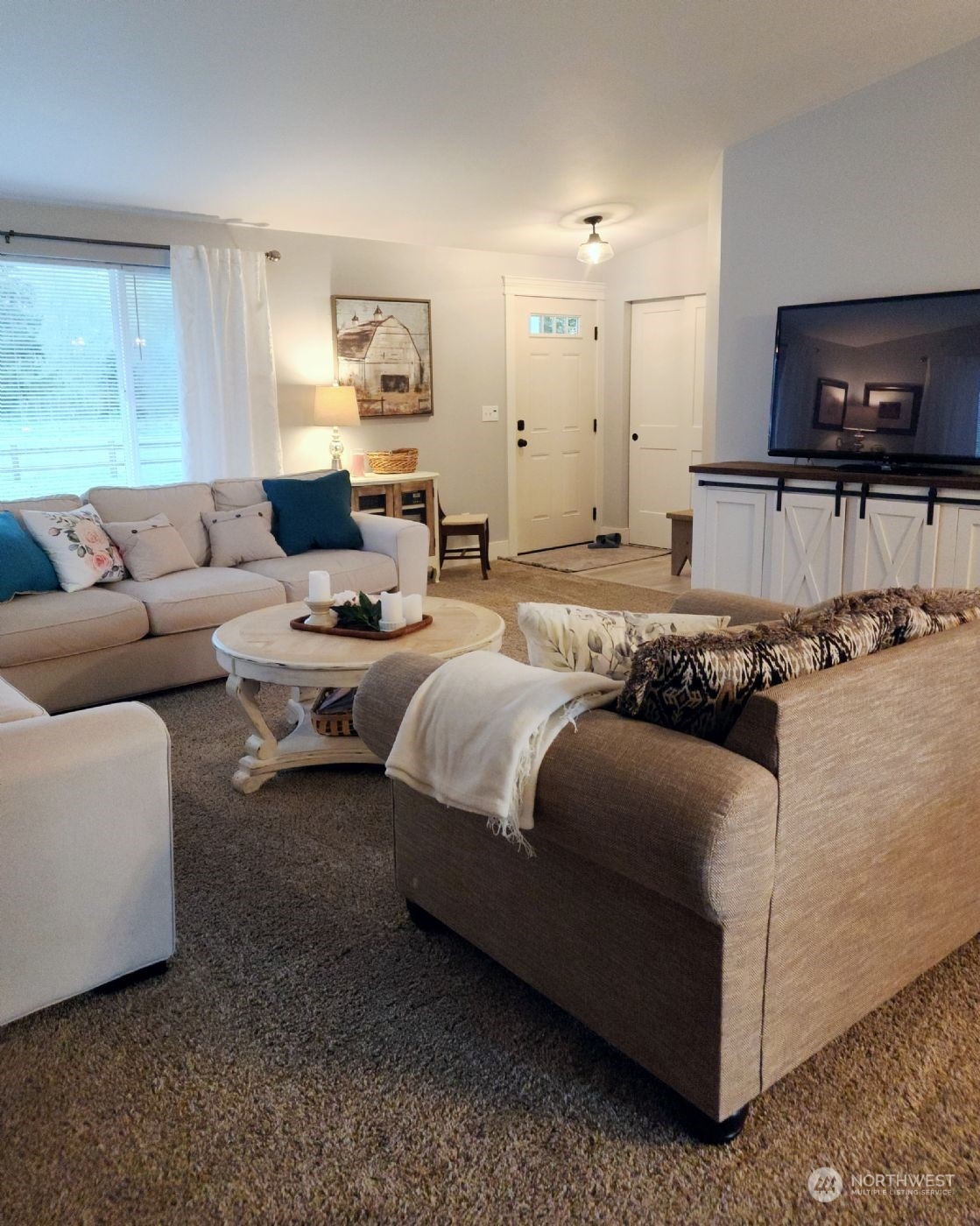 19312 Patterson Road East Orting, WA 98360 - Photo 10 of 39 a living room with furniture and a flat screen tv