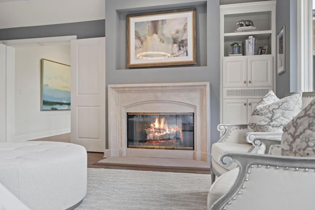 a spacious bedroom with a large bed and a window