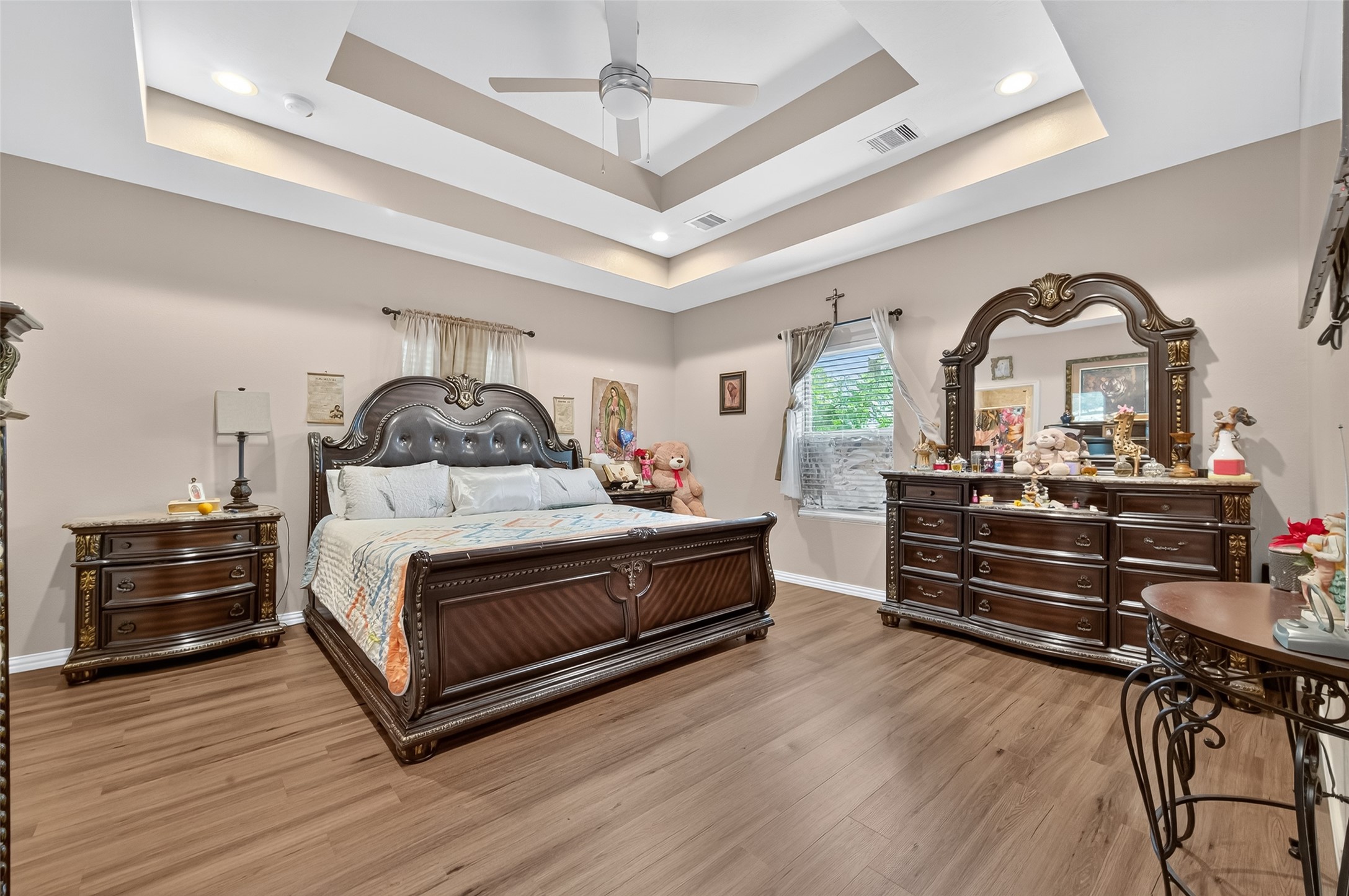 1619 Dolores Street Rosharon, TX 77583 - Photo 25 of 31 a bedroom with a bed and a chandelier
