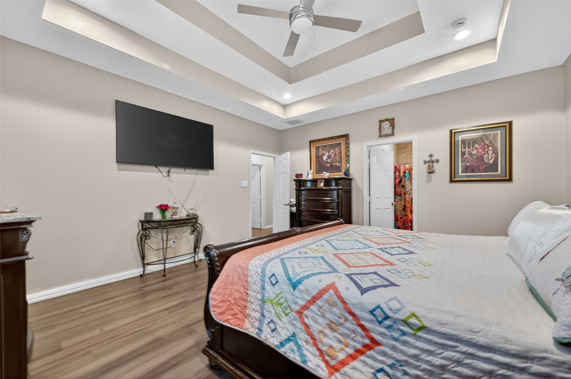 1619 Dolores Street Rosharon, TX 77583 - Photo 27 of 31 a bedroom with a bed and a flat screen tv