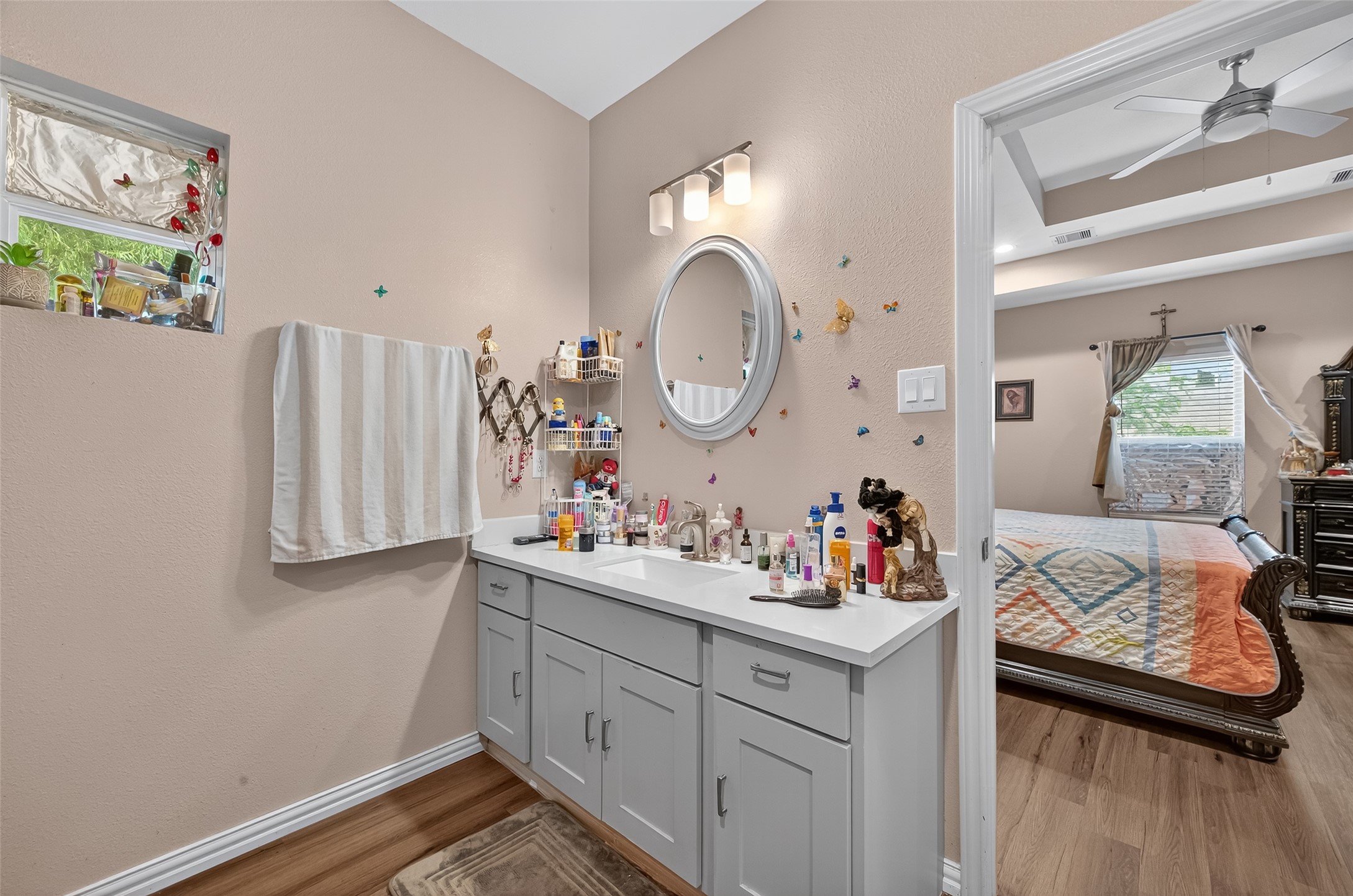 1619 Dolores Street Rosharon, TX 77583 - Photo 29 of 31 a bathroom with a sink mirror and vanity