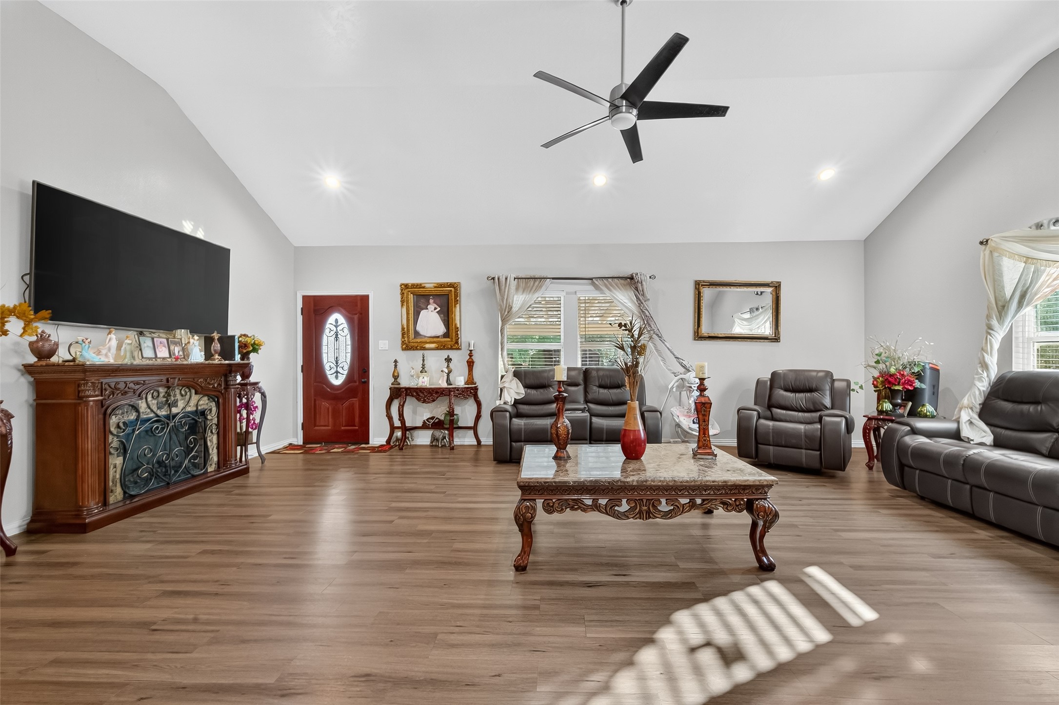 1619 Dolores Street Rosharon, TX 77583 - Photo 7 of 31 a living room with furniture and a flat screen tv