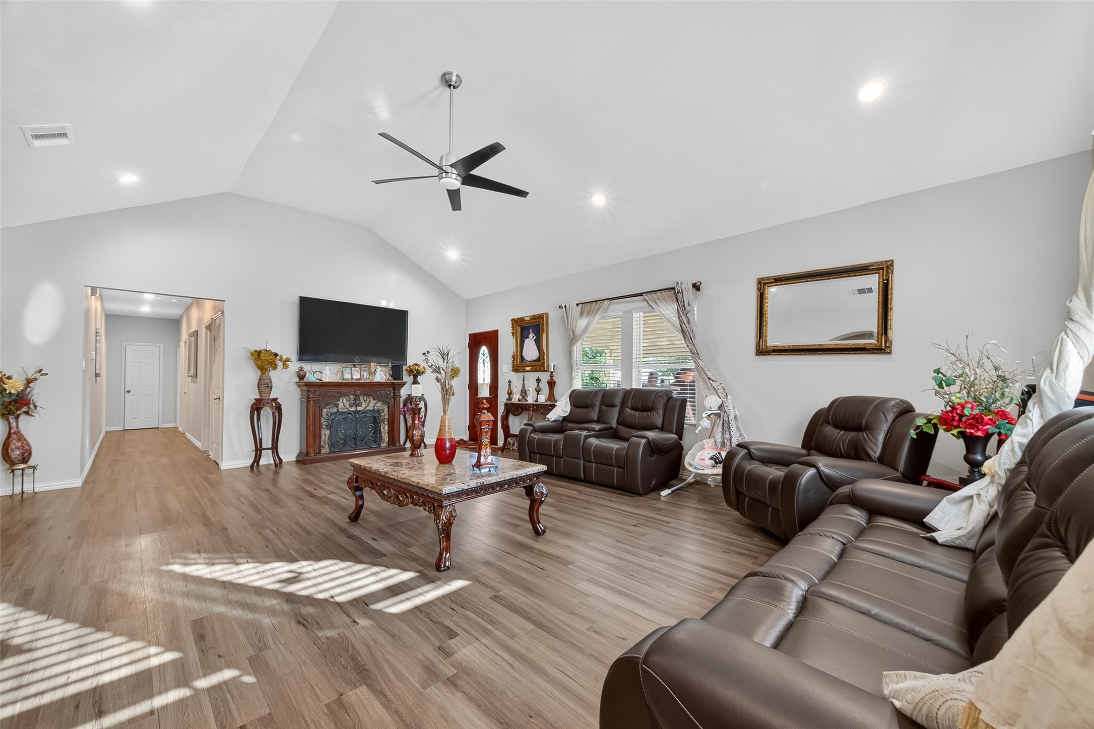 1619 Dolores Street Rosharon, TX 77583 - Photo 8 of 31 a living room with furniture and a flat screen tv