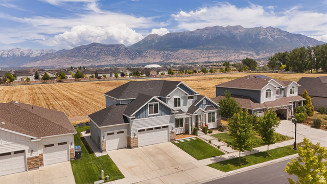 111 East Silver Oak Road Vineyard, UT 84059 - Photo 44 of 50 Modern American Foursquare style home with light blue siding and stone accents