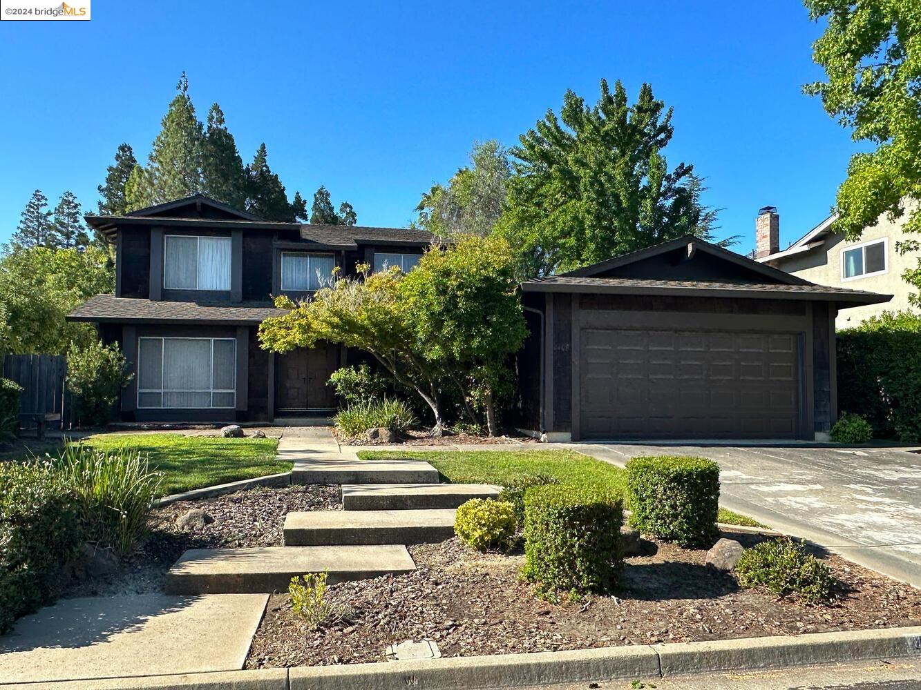 4408 Snowcloud Court Concord, CA 94518 - Photo 1 of 1 a front view of a house with a yard