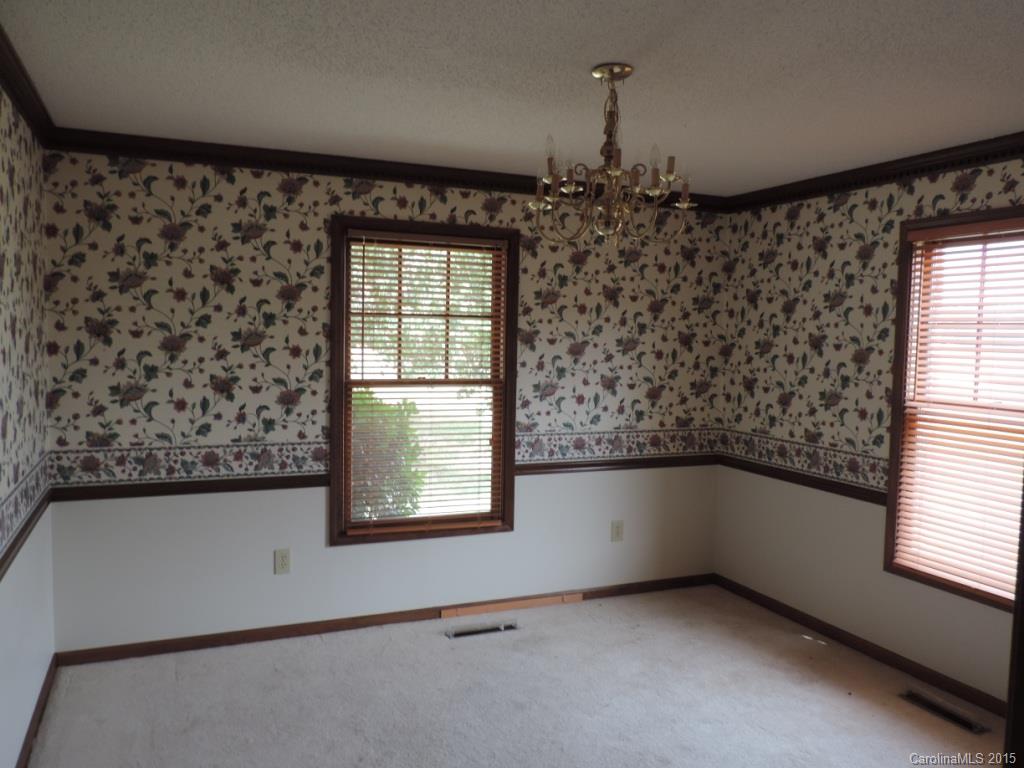 225 Woodridge Road Mooresville, NC 28115 - Photo 17 of 23 an empty room with windows
