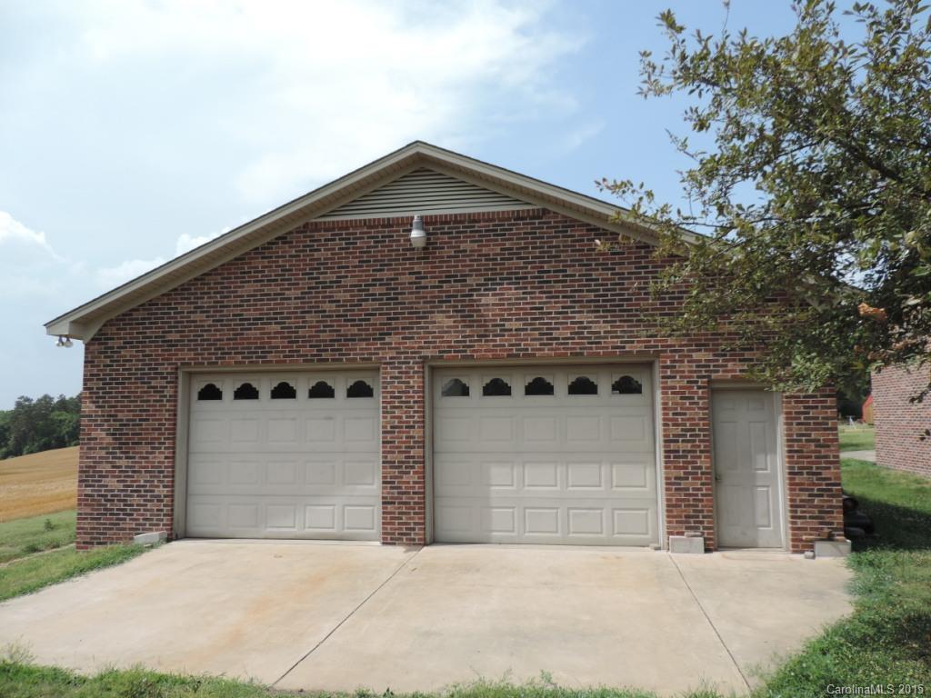 225 Woodridge Road Mooresville, NC 28115 - Photo 23 of 23 front view of a house with a garage