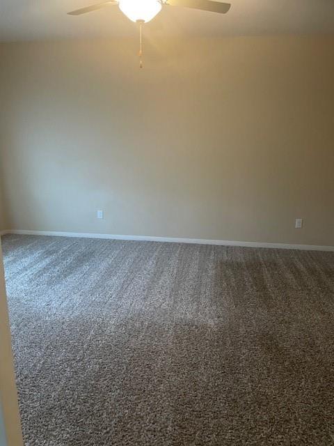 205 Lake Ridge Princeton, TX 75407 - Photo 8 of 13 Unfurnished room featuring a ceiling fan and carpet floors