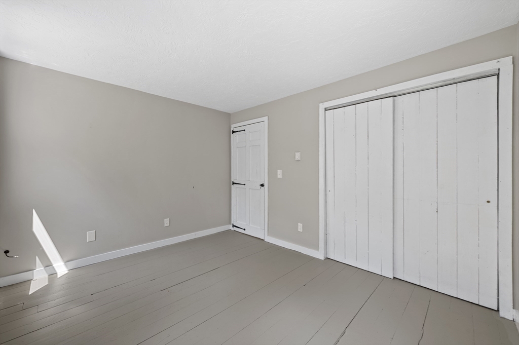 254 Adams Road Oakham, MA 01068 - Photo 13 of 29 a view of an empty room