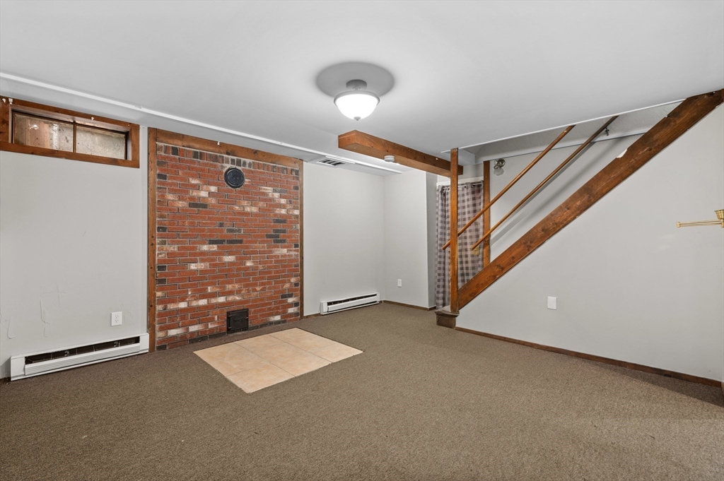 254 Adams Road Oakham, MA 01068 - Photo 20 of 29 a view of an empty room with a window