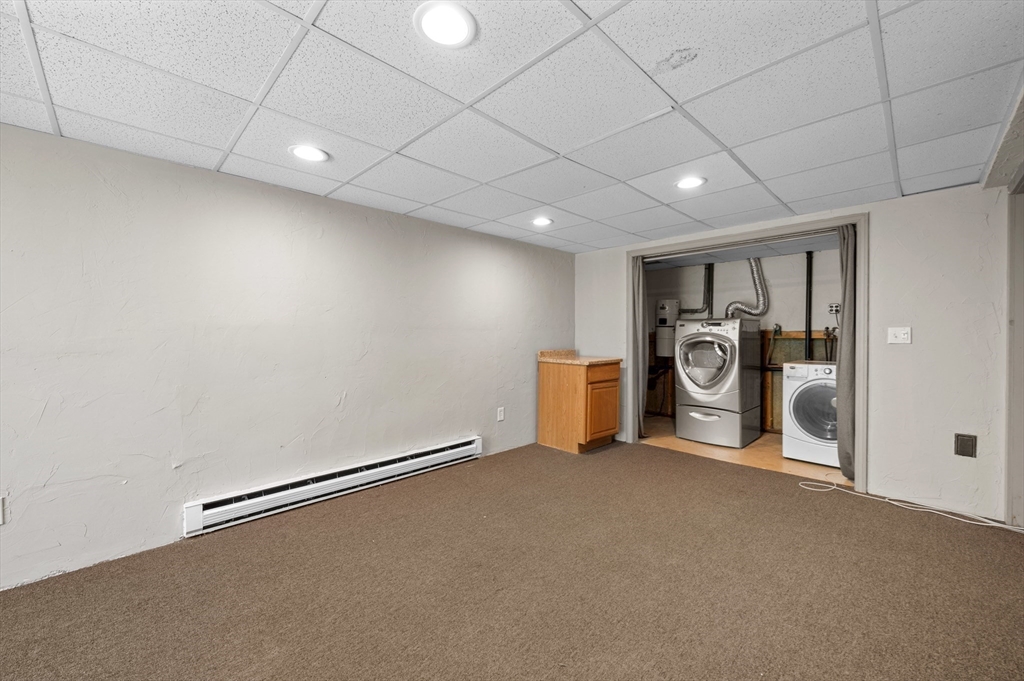 254 Adams Road Oakham, MA 01068 - Photo 22 of 29 a view of a storage & utility room with a sink