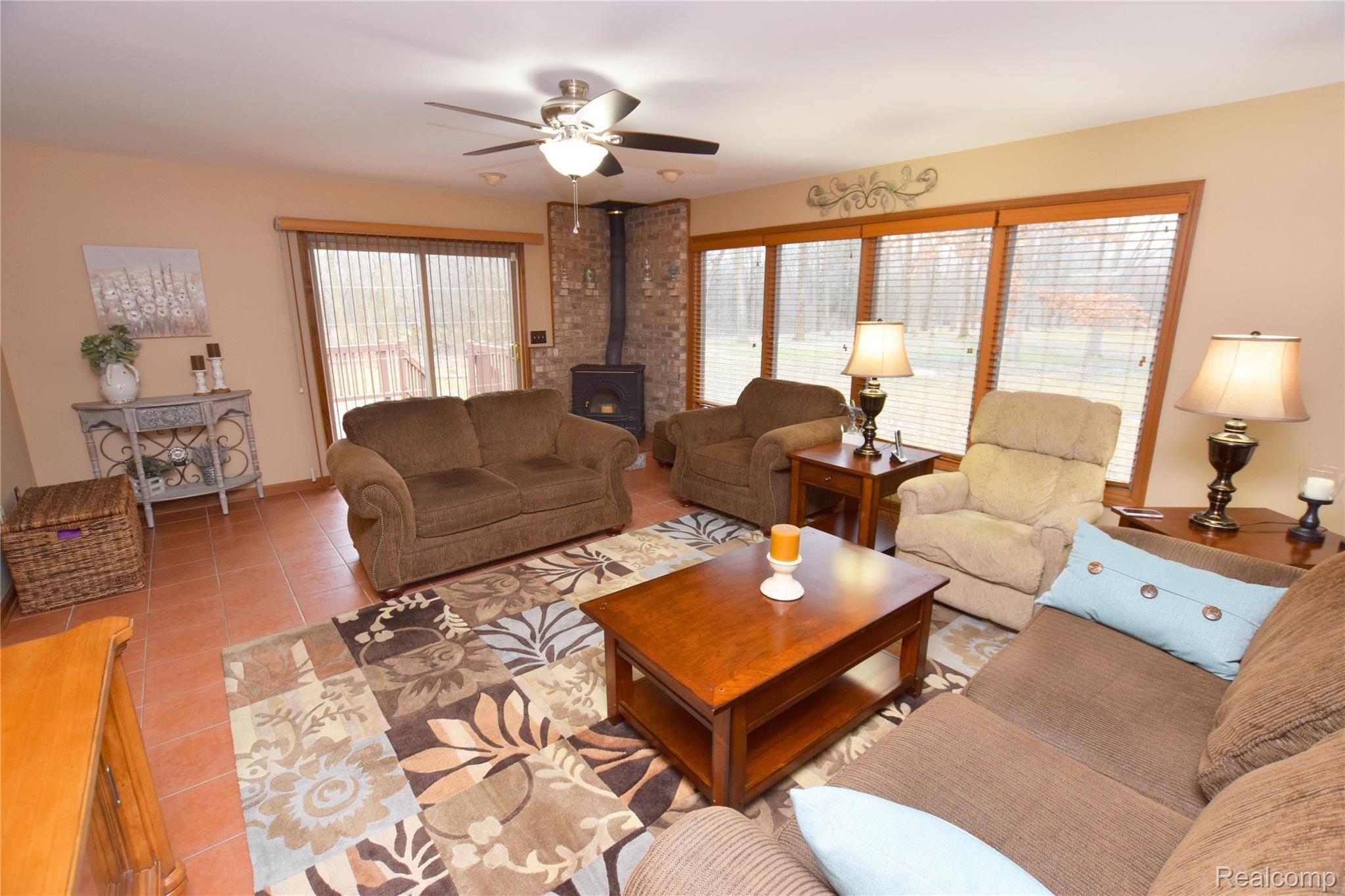 5292 Howe Road Grand Blanc, MI 48439 - Photo 3 of 16 Living Room with Walkout to Deck