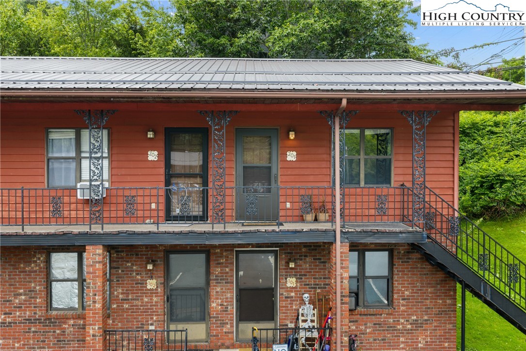 1469 West King Street, Unit 201 Boone, NC 28607 - Photo 1 of 19 a view of a house with a porch