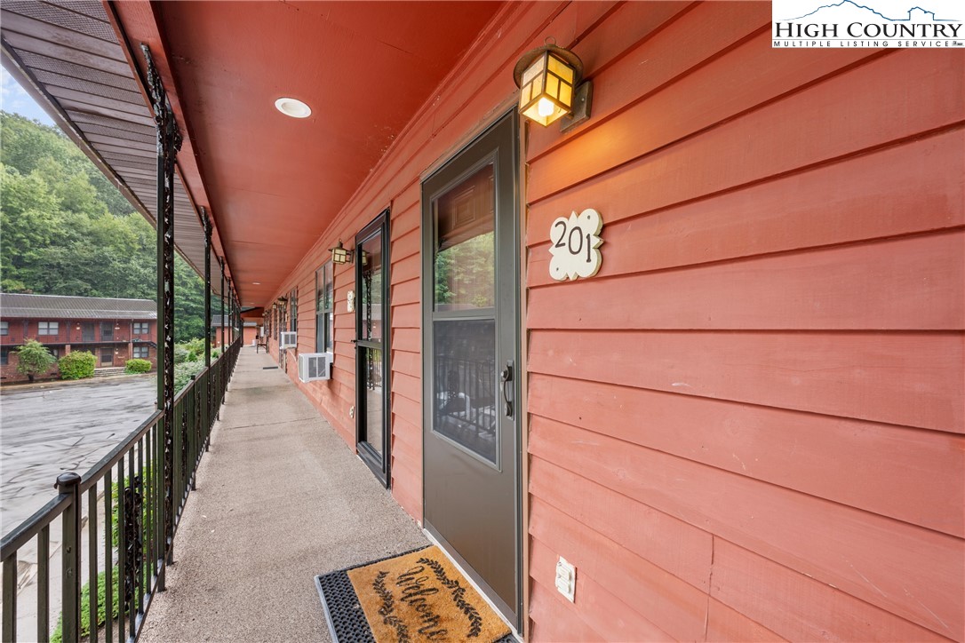 1469 West King Street, Unit 201 Boone, NC 28607 - Photo 2 of 19 a view of a pathway along with stairs