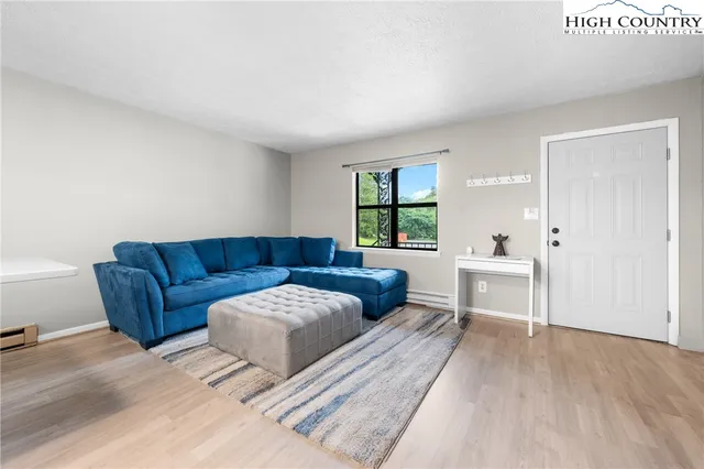 a living room with a couch and a table