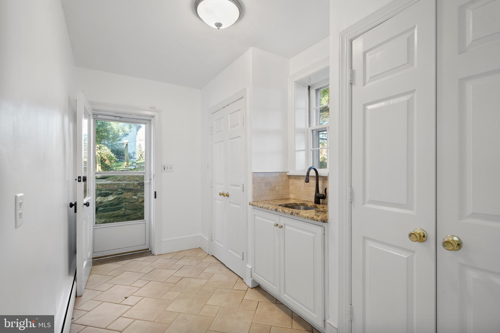1025 North Chatham Road West Grove, PA 19390 - Photo 13 of 44 a bathroom with a sink and a mirror